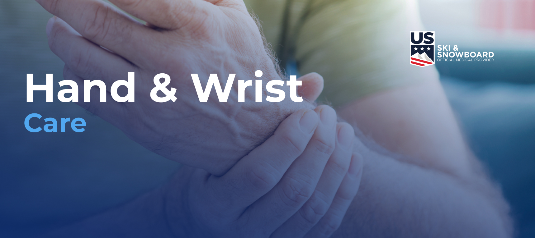 A person holding their wrist with the other hand. Text overlay reads "Hand & Wrist Care" with a US Ski & Snowboard logo.
